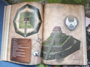 Das Bild aus dem Pen-and-Paper Buch zeigt eine gigantische steinerne Pyramide mit zahlreichen Details von oben und von vorne.