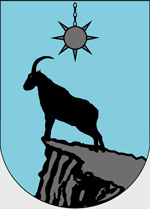 Ein Widder auf einem Felsen unter einem Morgenstern auf blauem Grund ist das Wappen der Familie Xandain.